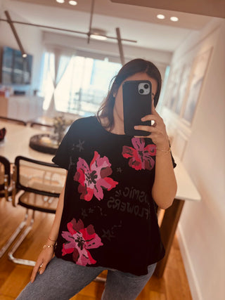 Remera cósmic flowers